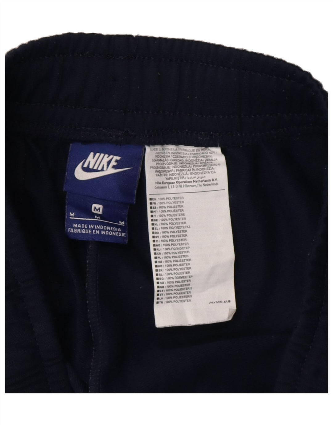 NIKE Mens Tracksuit Trousers Joggers Medium  Navy Blue Polyester Vintage Nike and Second-Hand Nike from Messina Hembry 