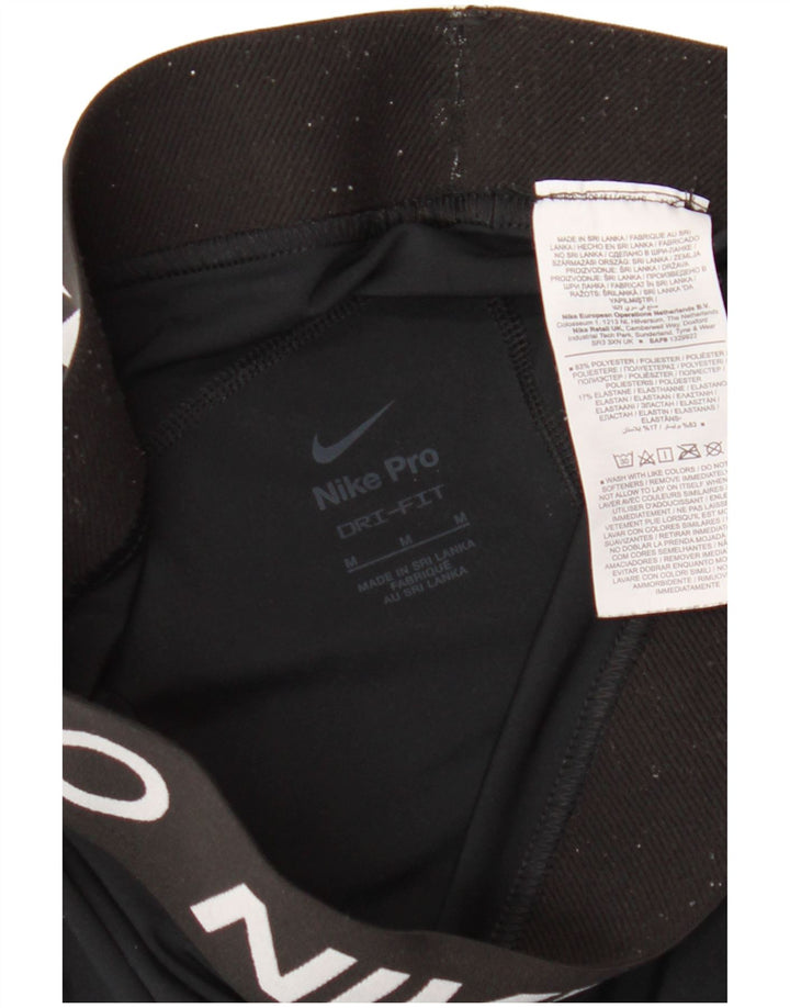 Γυναικείο γραφικό αθλητικό σορτς NIKE Dri Fit UK 12 μεσαίο μαύρο πολυεστέρα