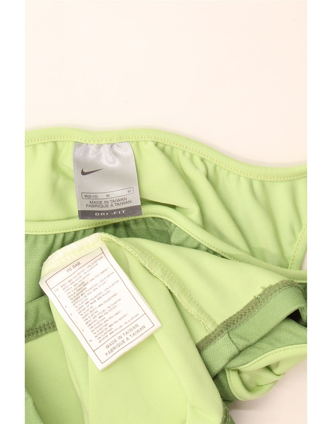 Γυναικείο γιλέκο Nike Dri Fit Crop Top US 8/10 Μεσαίο πράσινο πολυεστέρας