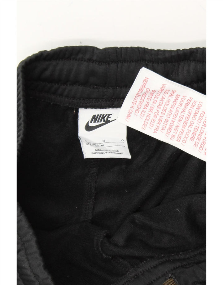 NIKE Boys Tracksuit Trousers 12-13 Years Large Black Polyester Vintage Nike and Second-Hand Nike from Messina Hembry 