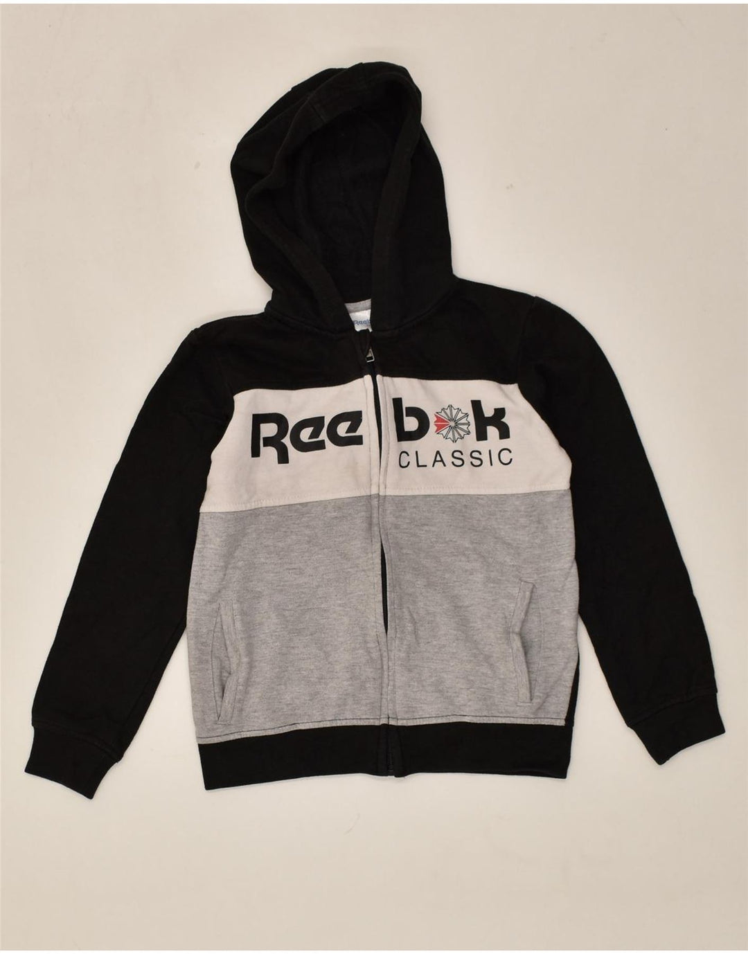 REEBOK Boys Graphic Zip Hoodie Sweater 6-7 Years Black Colourblock Cotton | Vintage Reebok | Thrift | Second-Hand Reebok | Used Clothing | Messina Hembry 