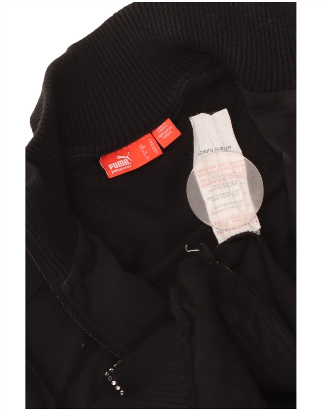 Γυναικεία φόρμα γραφικών Puma Top Jacket UK 12 Medium Black Colourblock