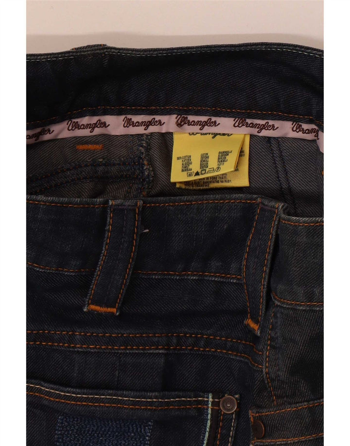 Γυναικεία τζιν φούστα Wrangler Susy W28 Βαμβακερή μεσαία γαλάζια
