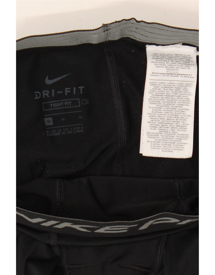 Ανδρικά κολάν Nike γραφικά στενή εφαρμογή από μεσαίο μαύρο πολυεστέρα