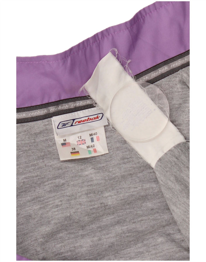 Γυναικεία αθλητική φόρμα Reebok Top Jacket UK 12 Medium Purple Polyester