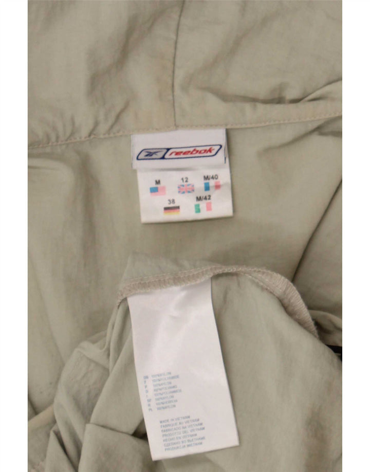 Reebok Γυναικείο μπουφάν βροχής με κουκούλα UK 12 Medium Beige Nylon