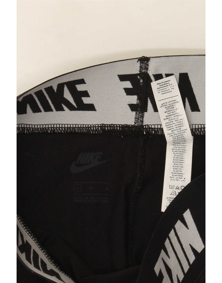 Γυναικεία γραφικά κολάν Nike UK 12 μεσαίο μαύρο βαμβακερό
