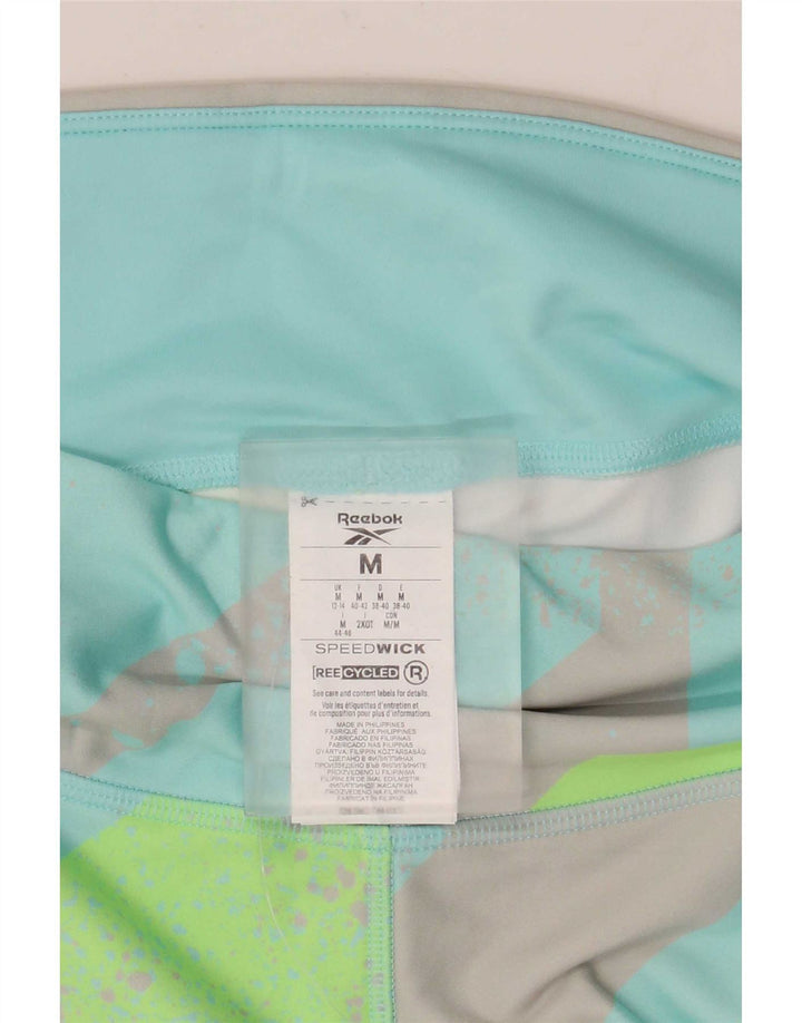 Reebok γυναικεία κολάν Capri UK 12/14 Μεσαίου Τυρκουάζ γεωμετρικού πολυεστέρα