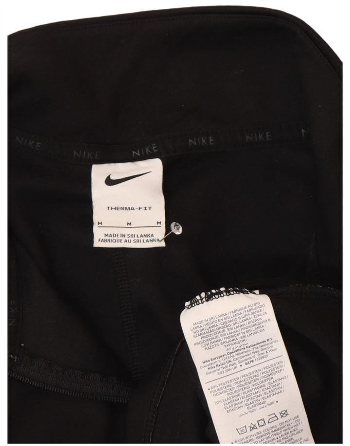 Γυναικεία φόρμα πουλόβερ με φερμουάρ Nike Therma-Fit Top UK 14 Medium Black