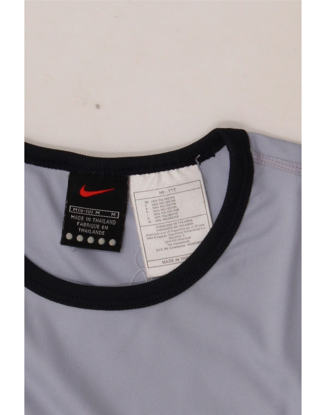 Γυναικείο τοπ NIKE Crop Μακρυμάνικο US 8/10 Μεσαίο μπλε πολυεστέρας