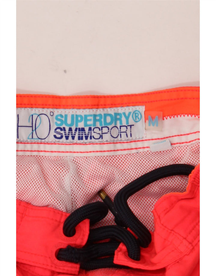 Ανδρικό γραφικό σορτς κολύμβησης SUPERDRY με μεσαίο πορτοκαλί πολυεστέρα