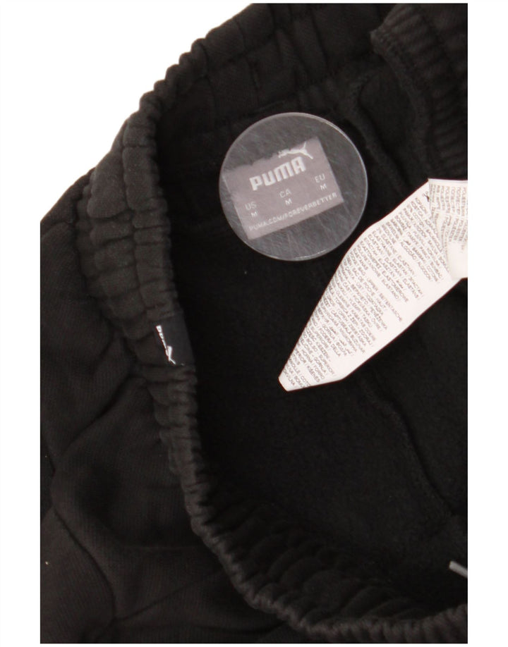 Ανδρική αθλητική φόρμα Puma Graphic Παντελόνι Joggers Μεσαίο Μαύρο
