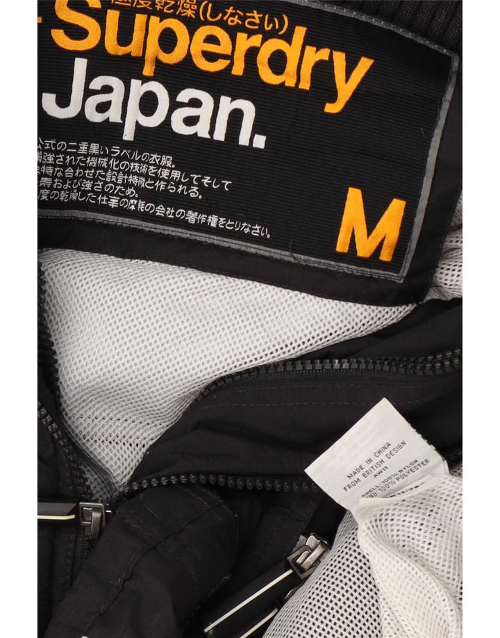 Superdry γυναικείο μπουφάν βροχής UK 14 Medium Μαύρο