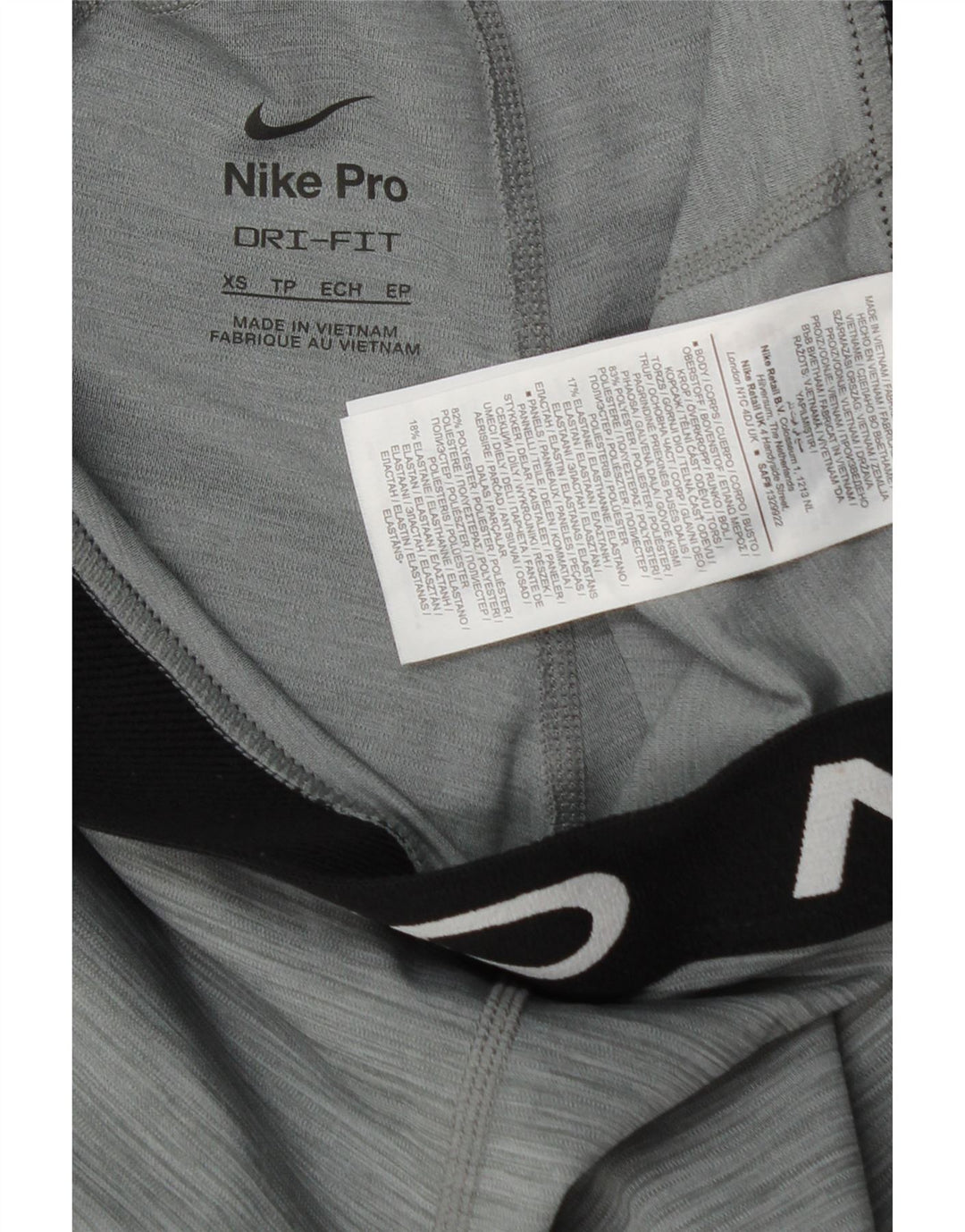 Γυναικεία γραφικά κολάν NIKE Dri Fit UK 4 XS με γκρι πολυεστέρα