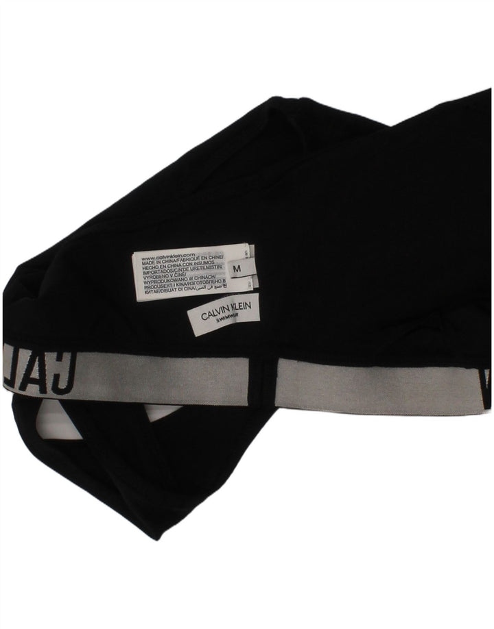 Γυναικείο γραφικό αθλητικό σουτιέν Calvin Klein Top Μεσαίο Μαύρο Πολυαμίδιο