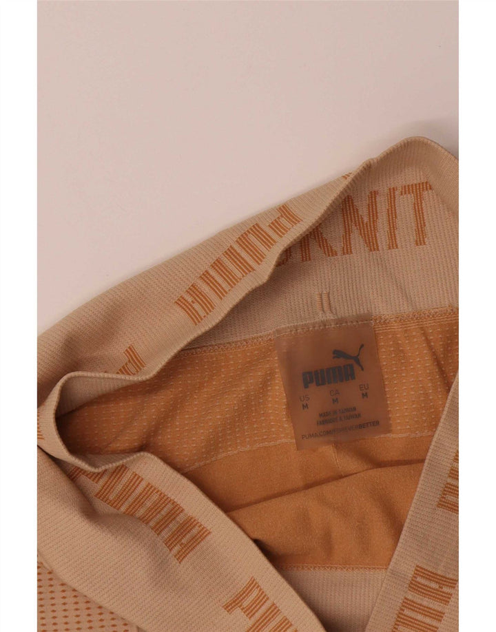 Γυναικεία γραφικά κολάν Puma UK 12 Medium Beige