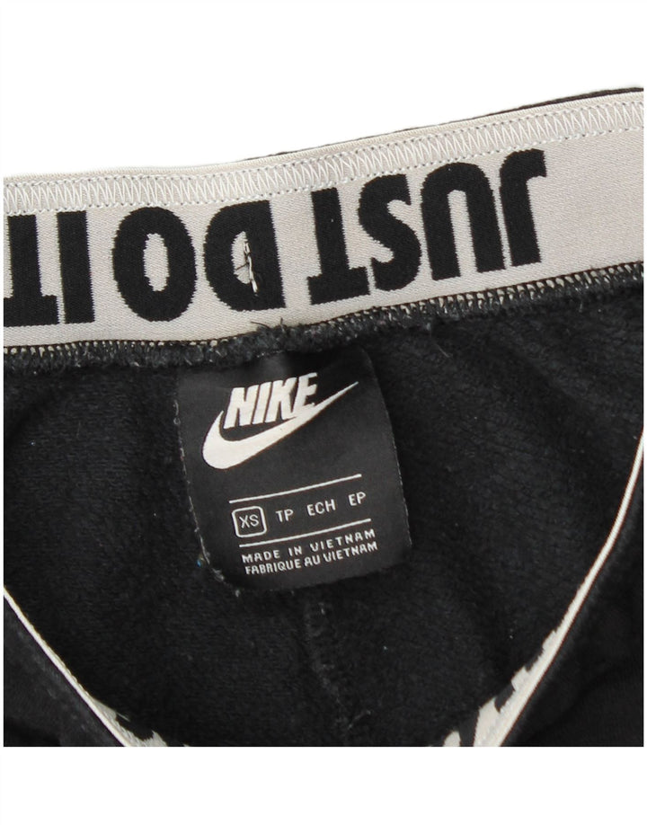 Γυναικεία αθλητική φόρμα NIKE γραφικά παντελόνια Joggers UK 4 XS Μαύρο βαμβακερό