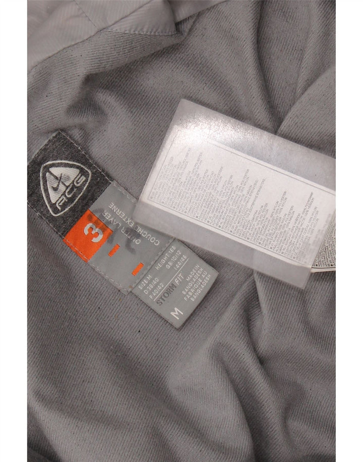 NIKE Γυναικείο τζάκετ αντιανεμικό μπουφάν UK 14 μεσαίου κόκκινου χρώματος