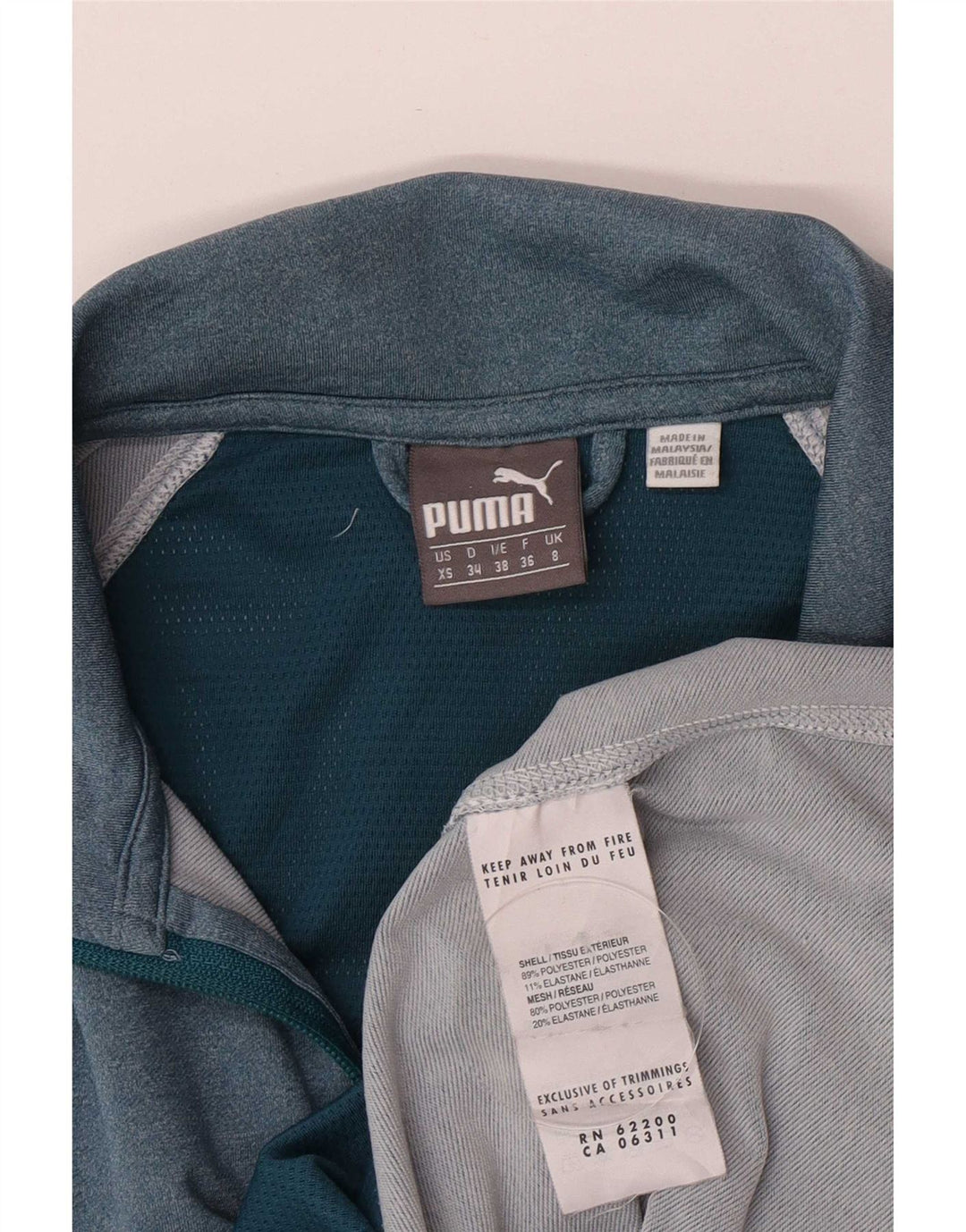 Γυναικεία αθλητική φόρμα Puma Top Jacket UK 8 Small Blue Colourblock Polyester