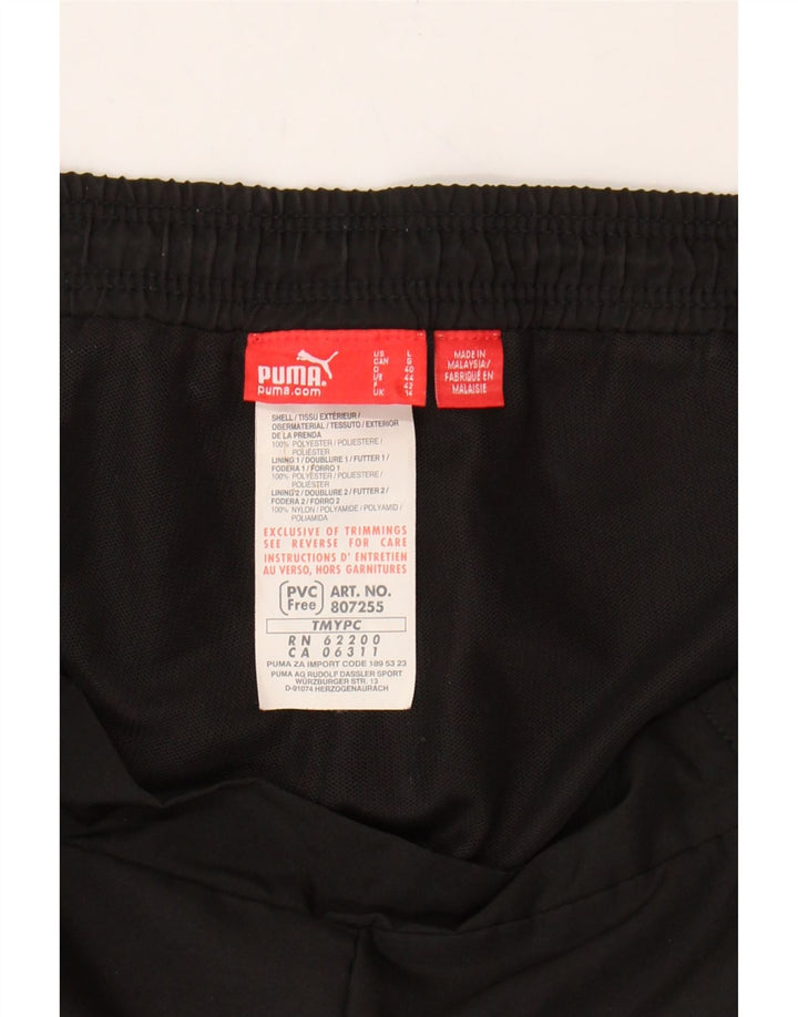 PUMA Womens Tracksuit Trousers UK 14 Large Black Polyester Vintage Puma and Second-Hand Puma from Messina Hembry 