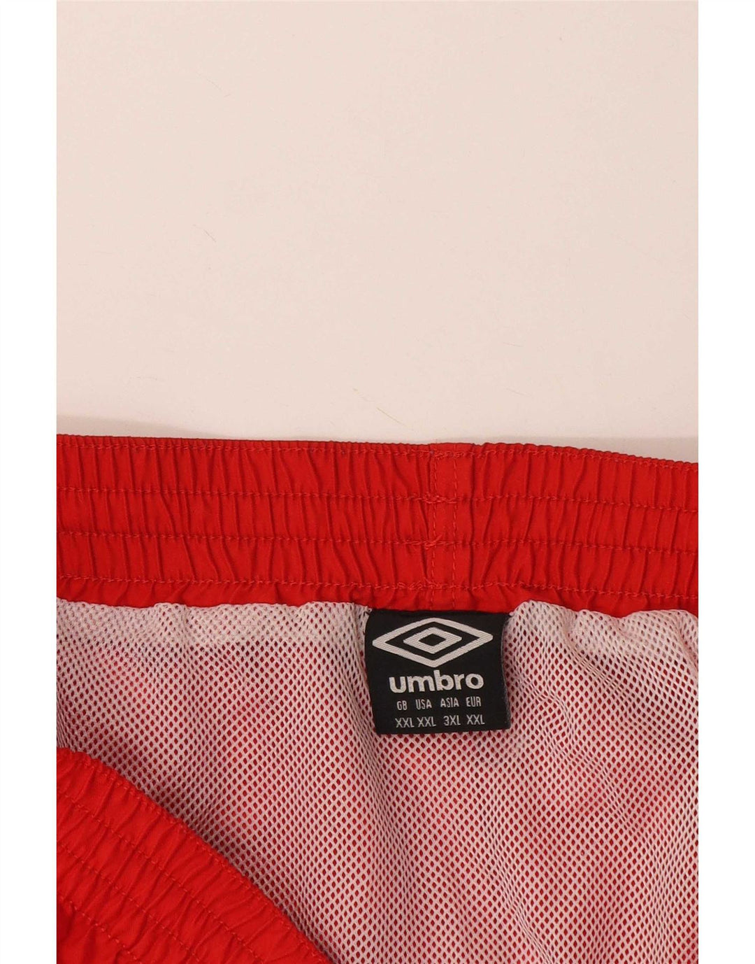 Γυναικείο αθλητικό σορτς Umbro 2XL Κόκκινο