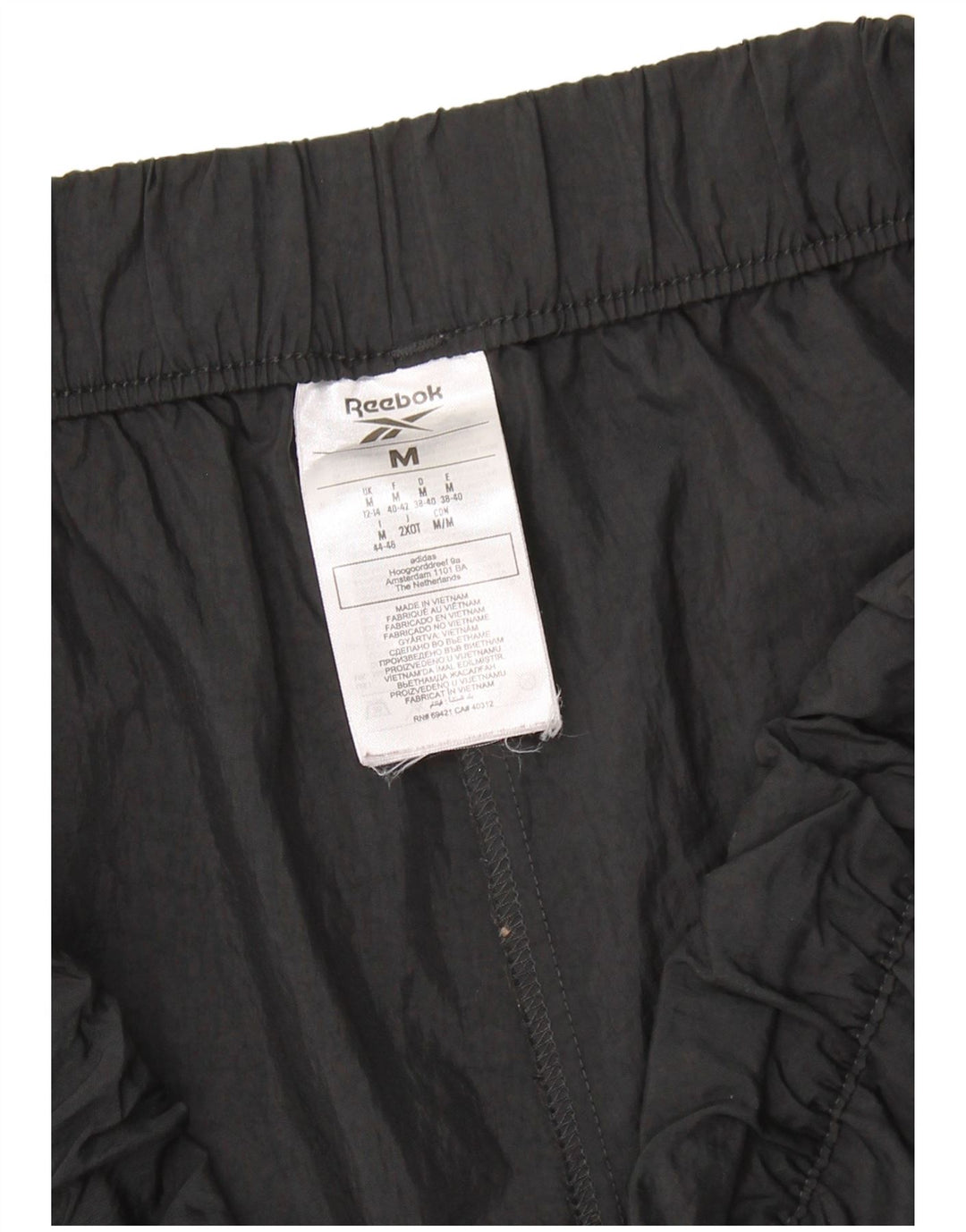 Γυναικεία αθλητική φόρμα REEBOK Παντελόνι Joggers UK 12/14 Medium Black Nylon