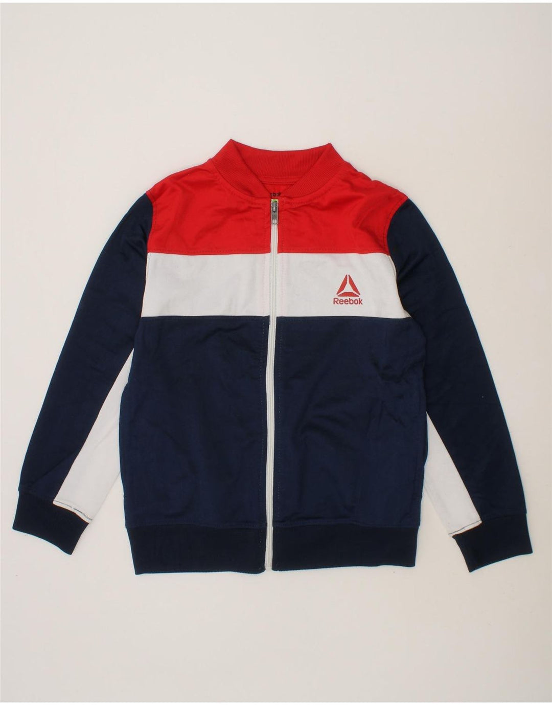REEBOK Boys Graphic Tracksuit Top Jacket 6-7 Years Navy Blue Colourblock Vintage Reebok and Second-Hand Reebok from Messina Hembry 