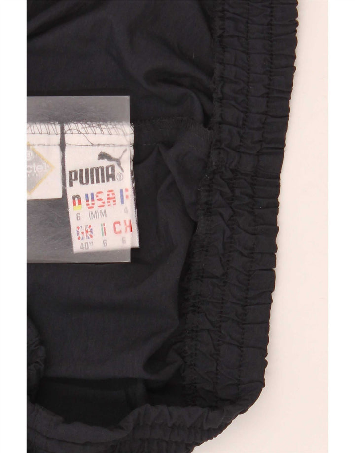 Ανδρική φόρμα Puma Παντελόνι Joggers Μεσαίο Μαύρο Πολυαμίδιο