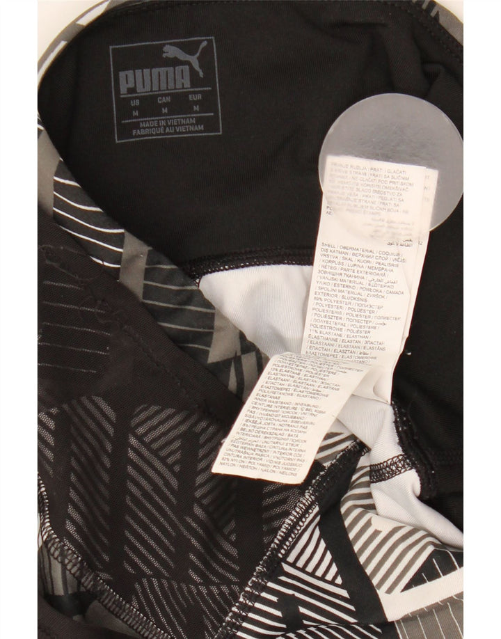 Puma Γυναικεία Κάπρι Κολάν UK 12 Μεσαίου Μαύρου Γεωμετρικού Πολυεστέρα