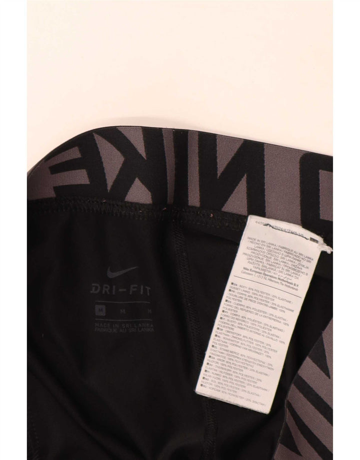 Γυναικεία κολάν Nike Dri Fit Graphic UK 14 Medium Black Polyester