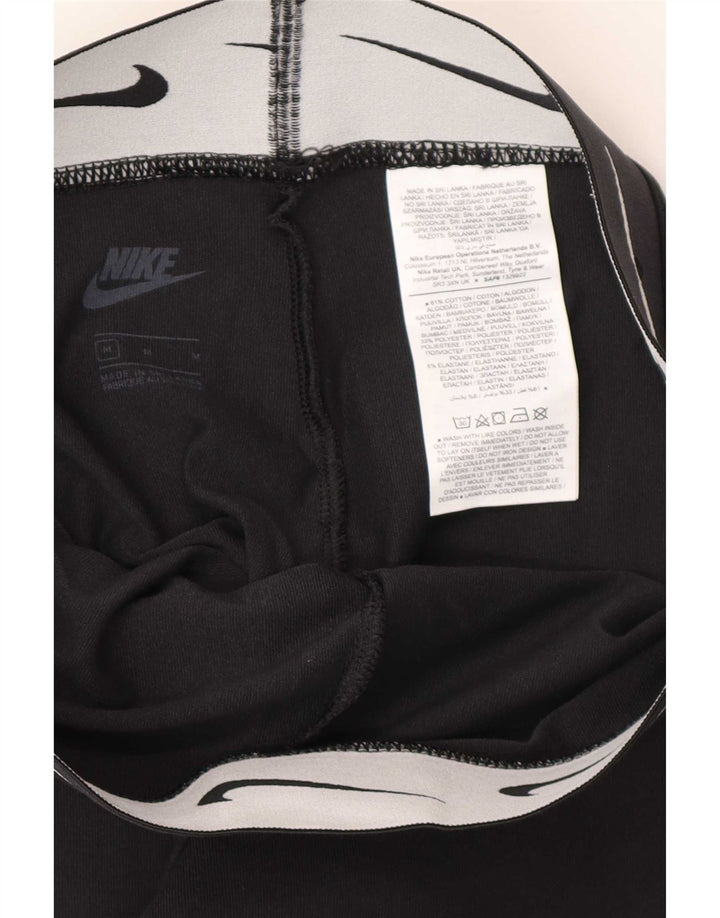 Γυναικεία γραφικά κολάν Nike UK 12 μεσαίο μαύρο βαμβακερό