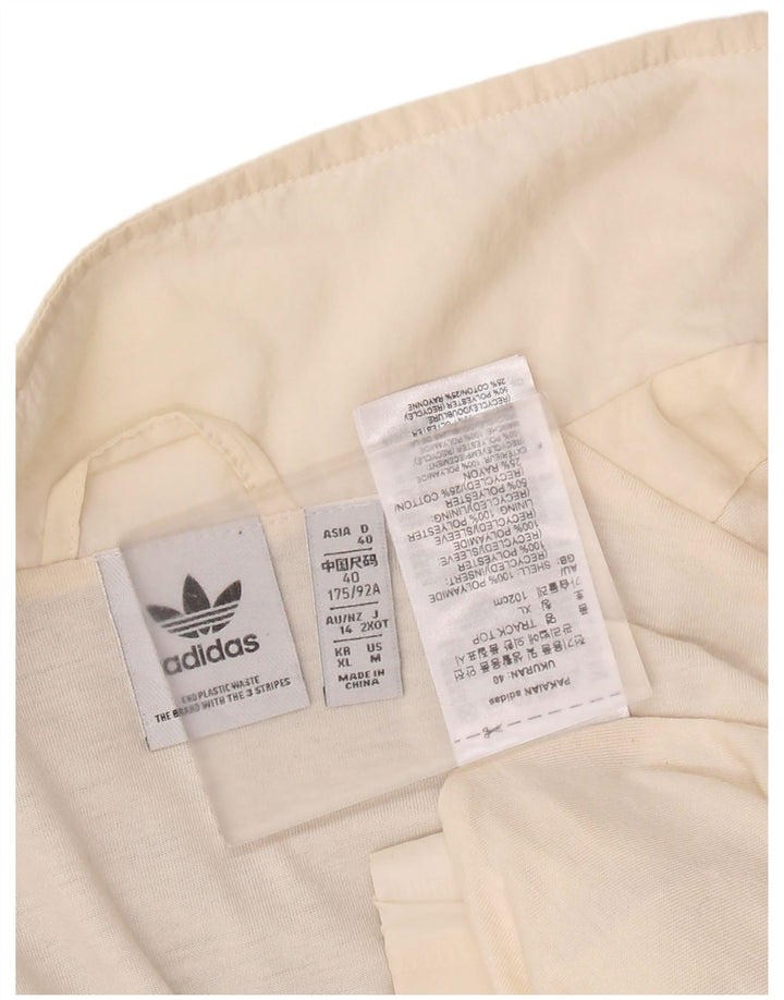 Γυναικεία αθλητική φόρμα γραφικών Adidas Top Jacket UK 14 Large Off White Polyamide