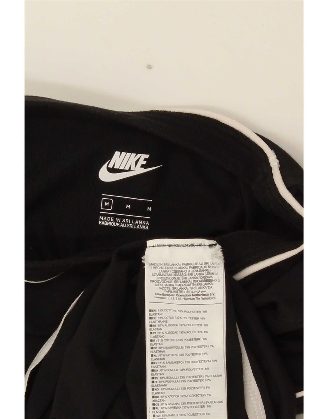 Γυναικείο γραφικό κορμάκι Nike UK 12 μεσαίο μαύρο βαμβακερό