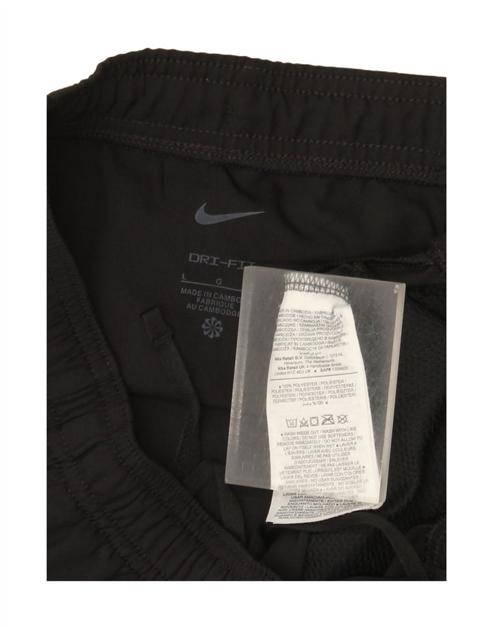 Γυναικεία αθλητική φόρμα Nike Dri Fit Παντελόνι UK 16 Large μαύρο πολυεστέρα