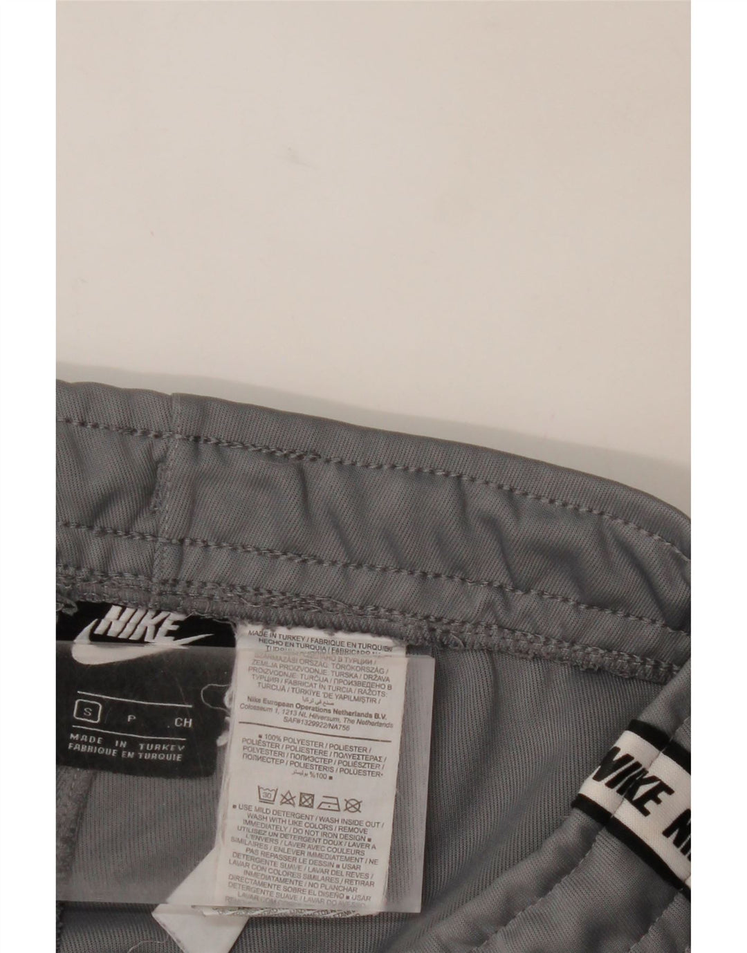 NIKE Mens Graphic Tracksuit Trousers Joggers Small  Grey Colourblock Vintage Nike and Second-Hand Nike from Messina Hembry 