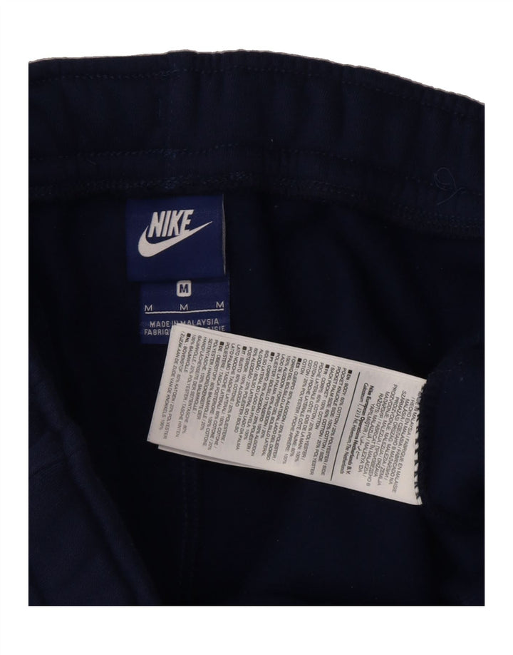 NIKE Mens Graphic Tracksuit Trousers Joggers Medium  Navy Blue Cotton Vintage Nike and Second-Hand Nike from Messina Hembry 