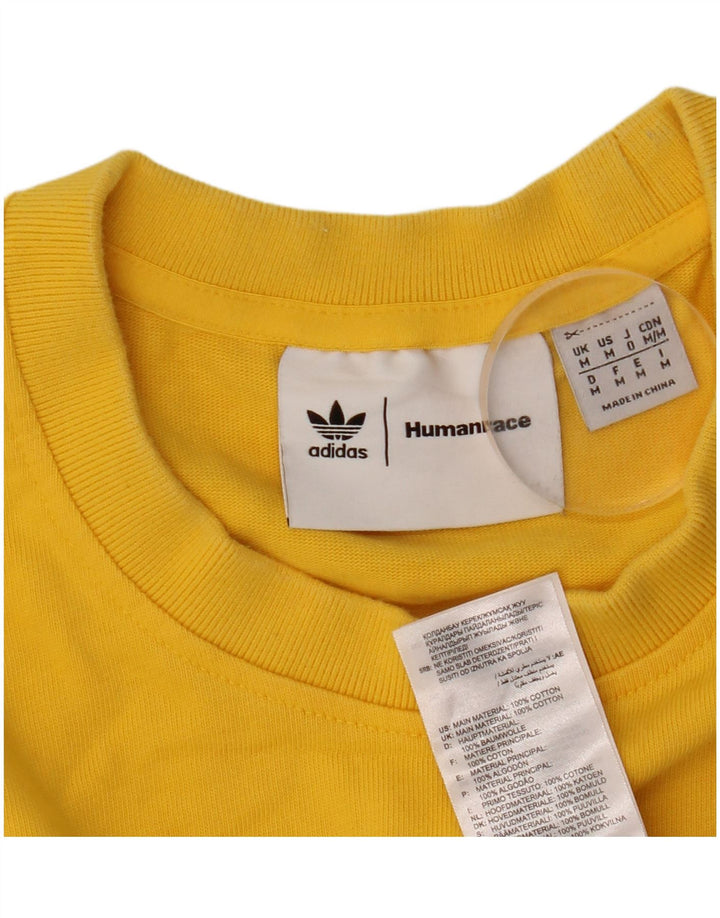 Ανδρικό T-Shirt Adidas Humanrace Τοπ μεσαίο κίτρινο βαμβακερό