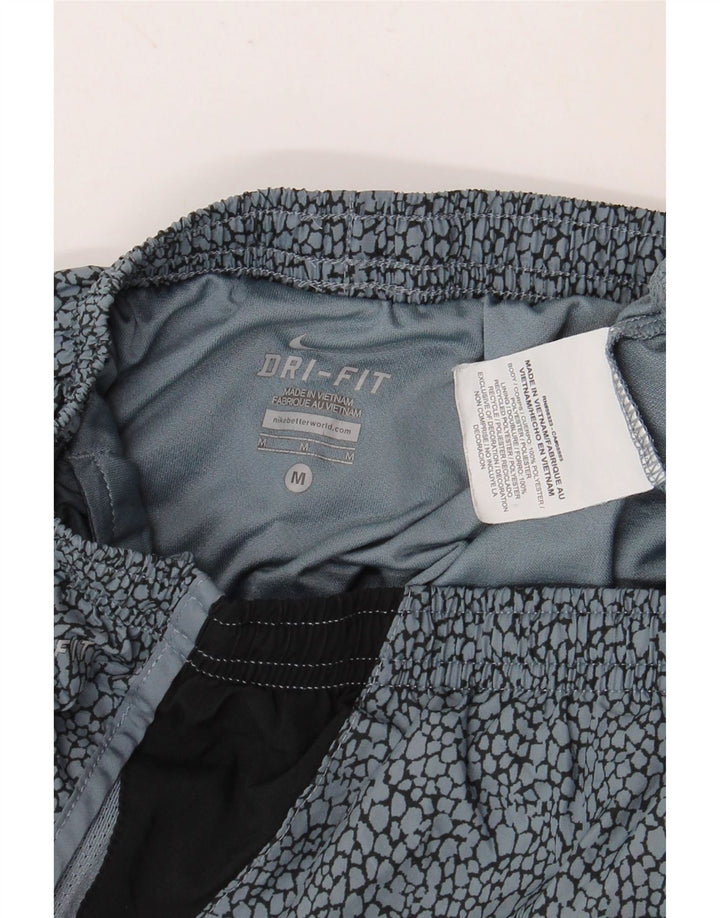 Γυναικείο αθλητικό σορτς NIKE Dri Fit UK 12 μεσαίου μπλε χρώματος πολυεστέρας