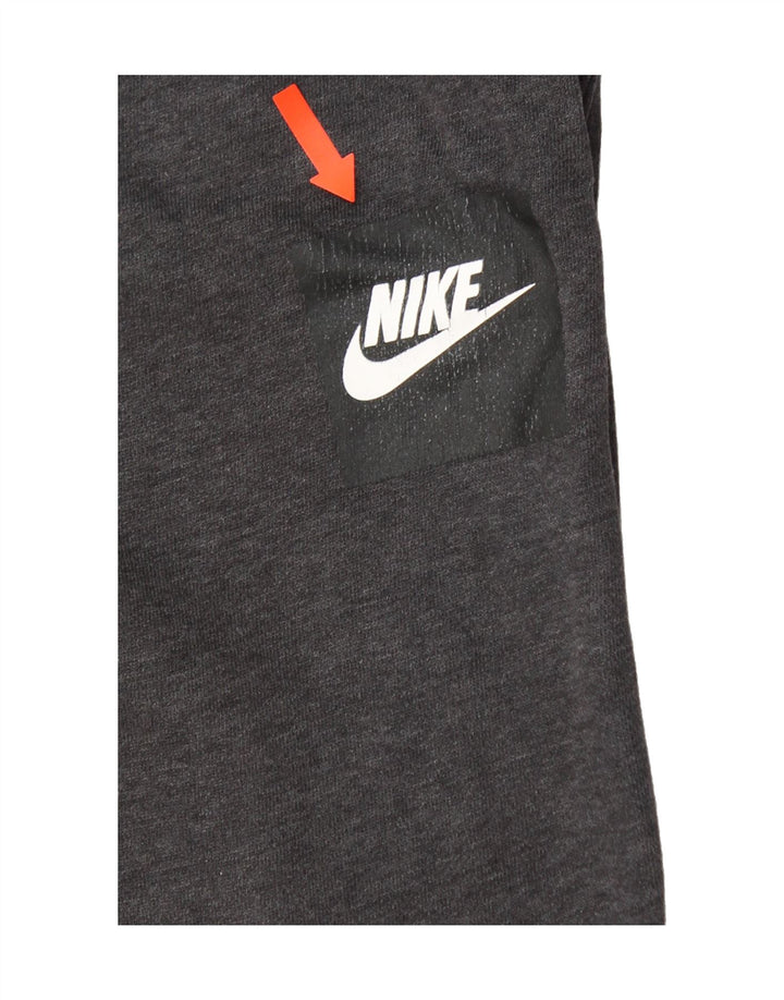 NIKE Mens Tracksuit Trousers Joggers Medium Grey Cotton Vintage Nike and Second-Hand Nike from Messina Hembry 