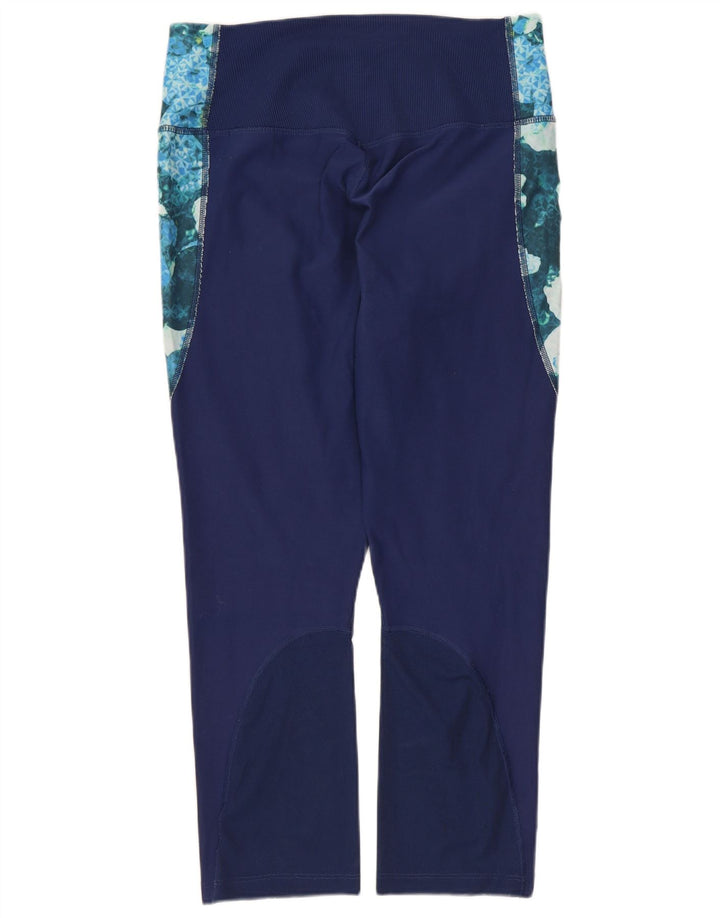 Γυναικεία κολάν Nike Dri Fit Capri UK 12 μεσαία πολύχρωμα φλοράλ