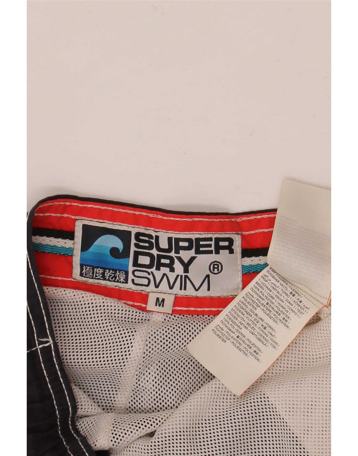 Ανδρικό γραφικό σορτς κολύμβησης Superdry με μεσαίο μπλε ναυτικό πολυεστέρα