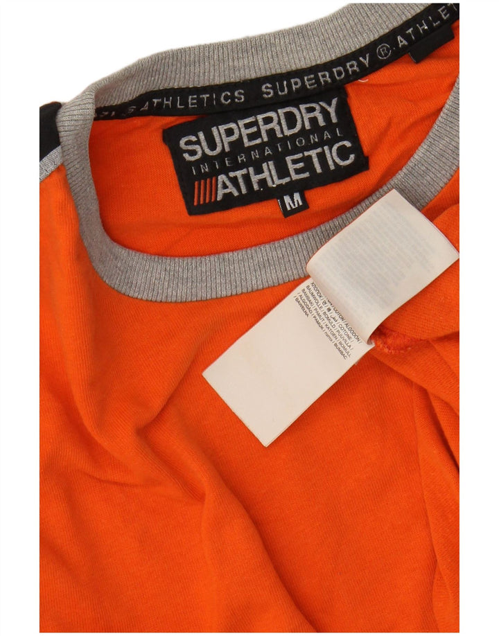Ανδρικό γραφικό μπλουζάκι SUPERDRY Τοπ μεσαίου πορτοκαλί χρώματος βαμβακερό