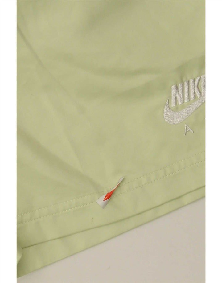 Γυναικείο αθλητικό σορτς Nike UK 10 Μικρό πράσινο πολυεστέρα