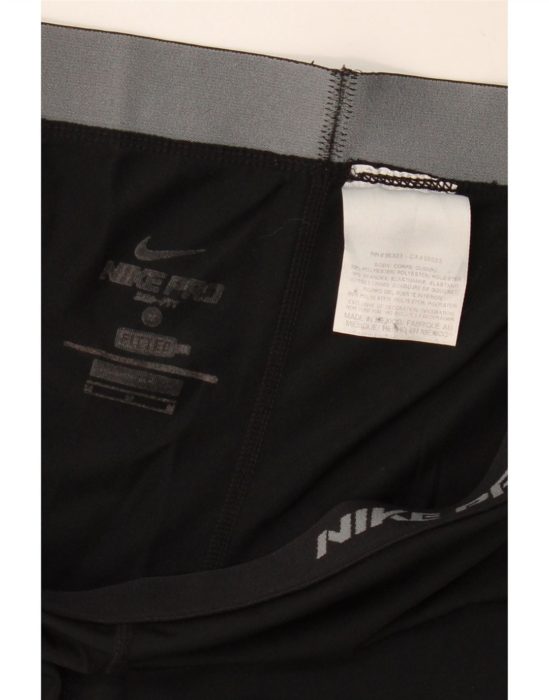 Γυναικεία αθλητική φόρμα Nike Dri Fit UK 12 μεσαίο μαύρο πολυεστέρα