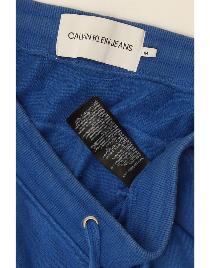 Ανδρικό αθλητικό σορτς Calvin Klein από μεσαίο μπλε βαμβακερό