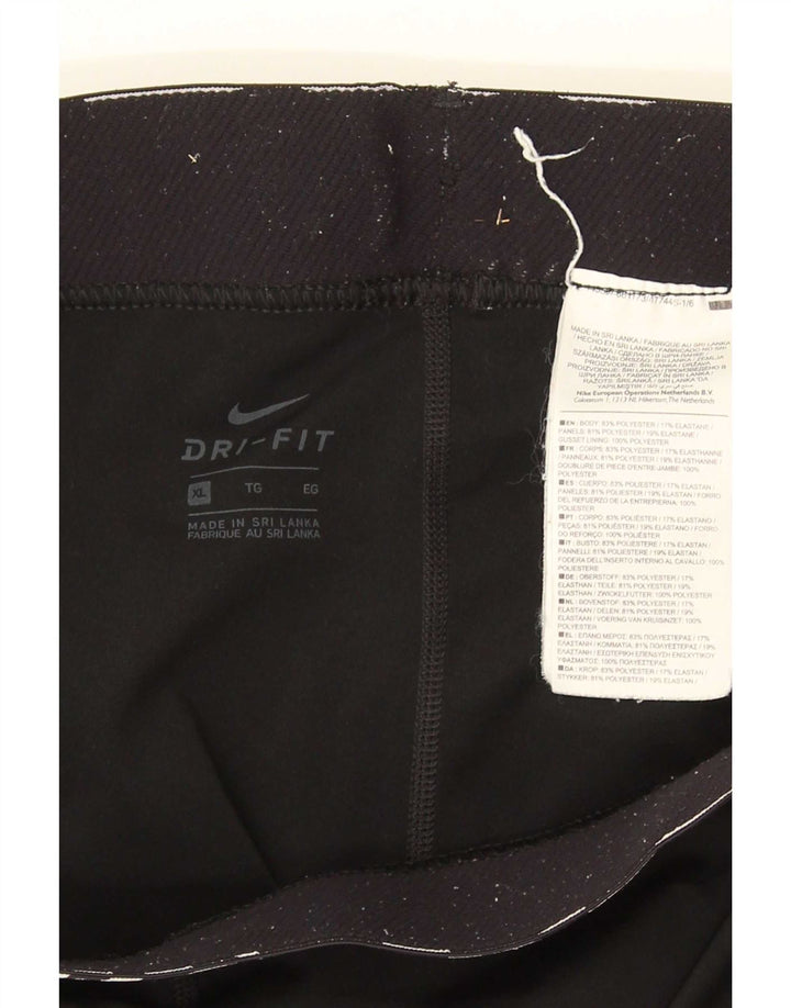 Γυναικείο κολάν Nike Dri Fit Capri UK 18 XL μαύρο πολυεστέρα