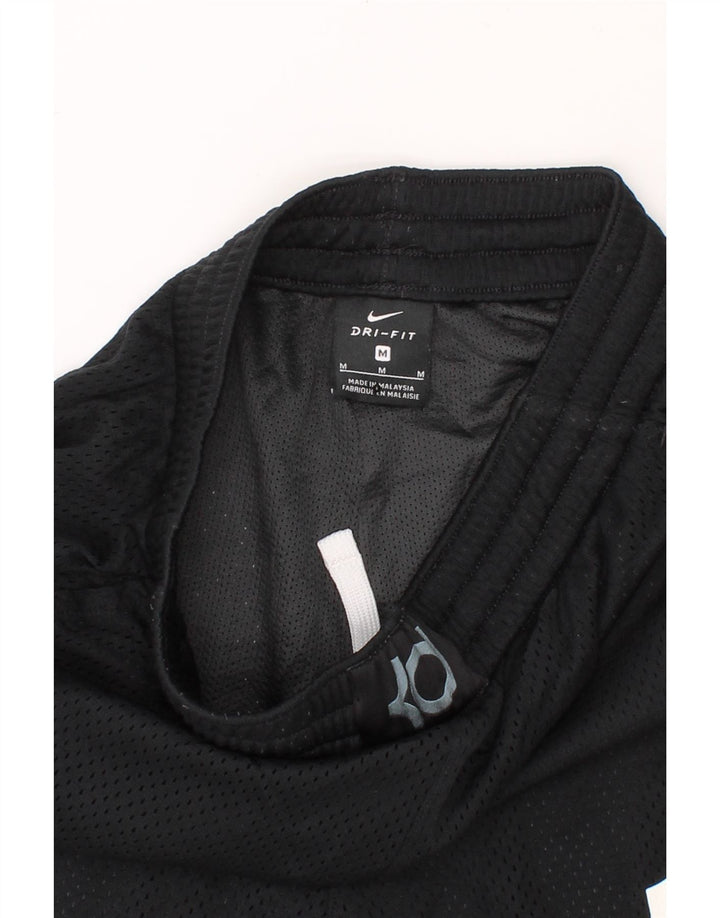 NIKE Boys Dri Fit Graphic Sport Shorts 10-11 Years Medium Black Polyester Vintage Nike and Second-Hand Nike from Messina Hembry 