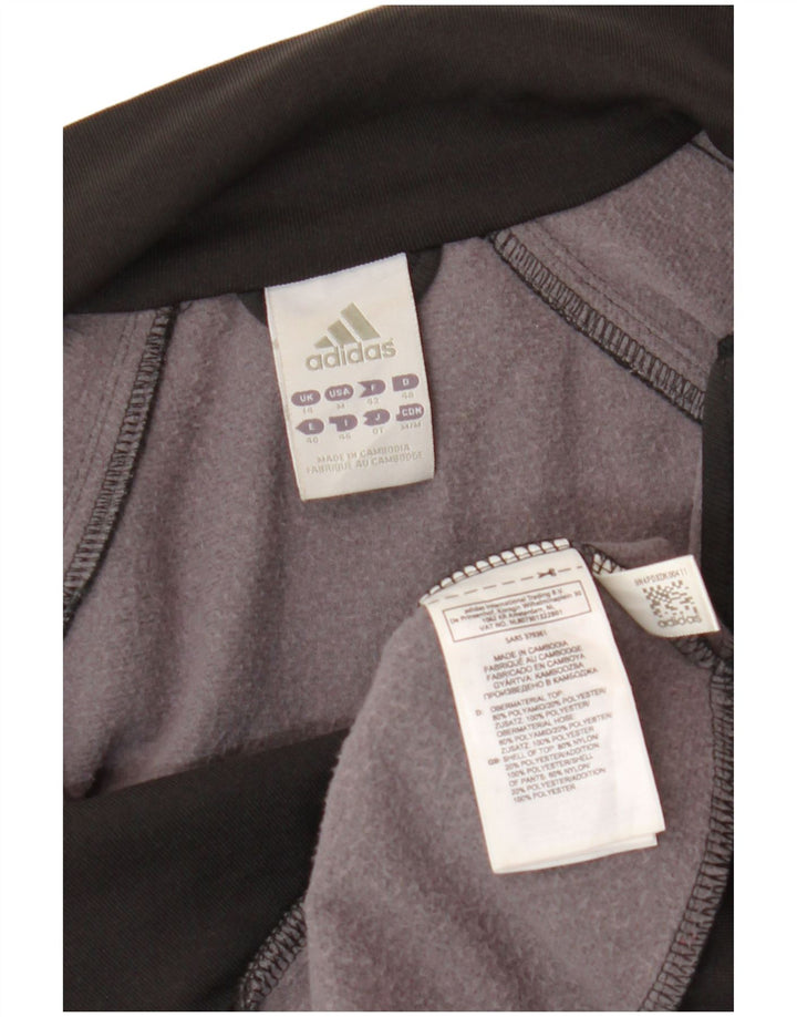 Γυναικεία αθλητική φόρμα Adidas Top Jacket UK 14 Medium Black Polyamide