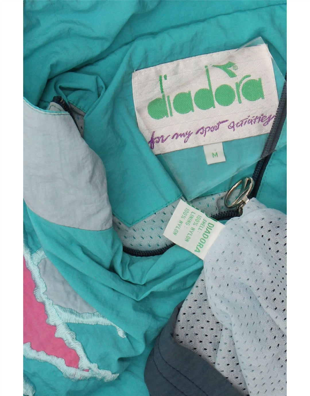 DIADORA Ανδρική φόρμα αθλητικής φόρμας με χαλαρή εφαρμογή, Μπουφάν μεσαίου μπλε χρώματος Nylon