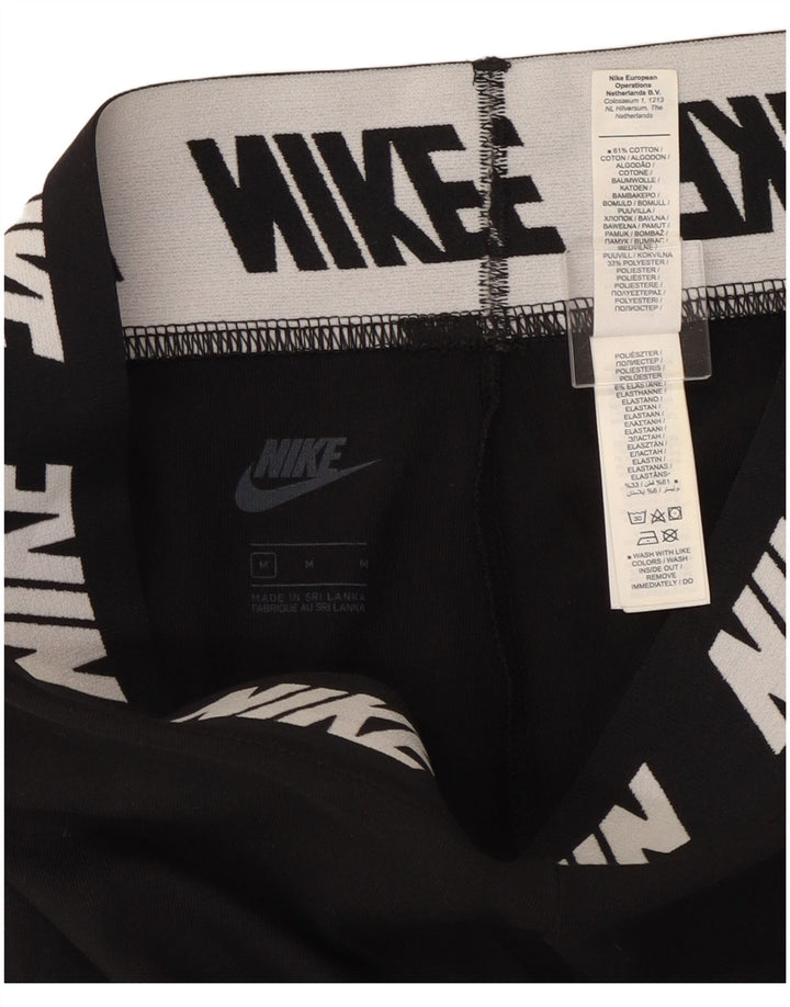 Γυναικεία γραφικά κολάν Nike UK 12 μεσαίο μαύρο βαμβακερό